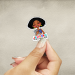 2025 Year Text Sticker - Dark-Skinned Woman with Natural Hair & NWT Bible - Psalm 96:8